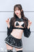 cos_utan wears a shiny wetlook costume at the Pharfaite Showcase 4 event 2026