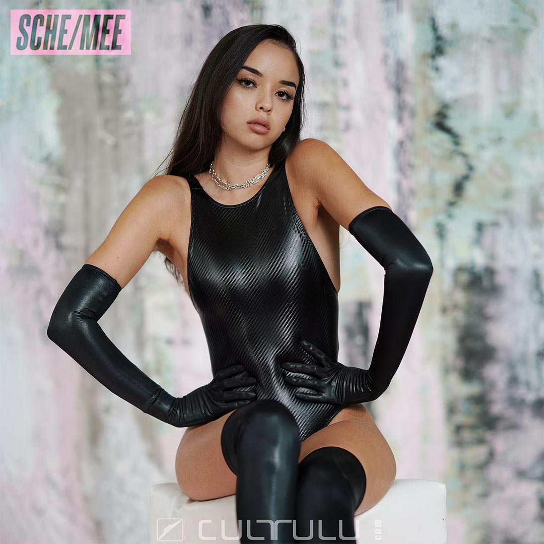 Vani wears Sche-Mee rubberized swimsuit SM105 in carbon